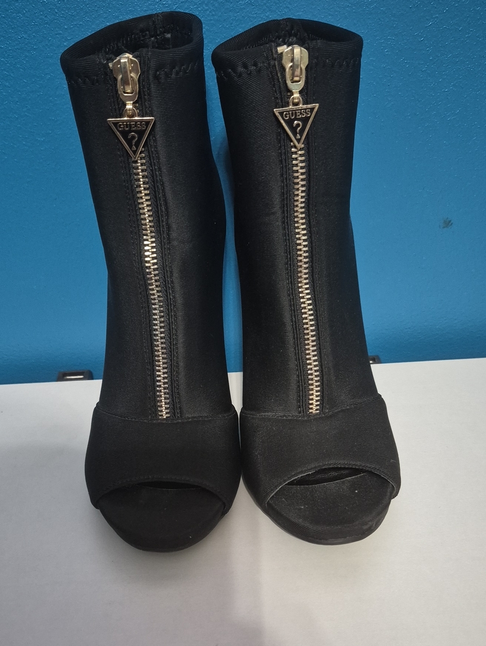 GUESS Black Peep Toe Zip Front Ankle Booties with Gold Hardware